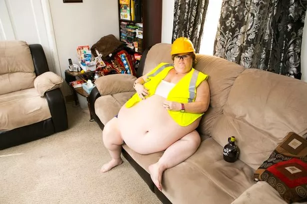 Gayla Neufeld, 52, who is using her 96 inch belly to entice men from around the world, including devoted hubby, Lance